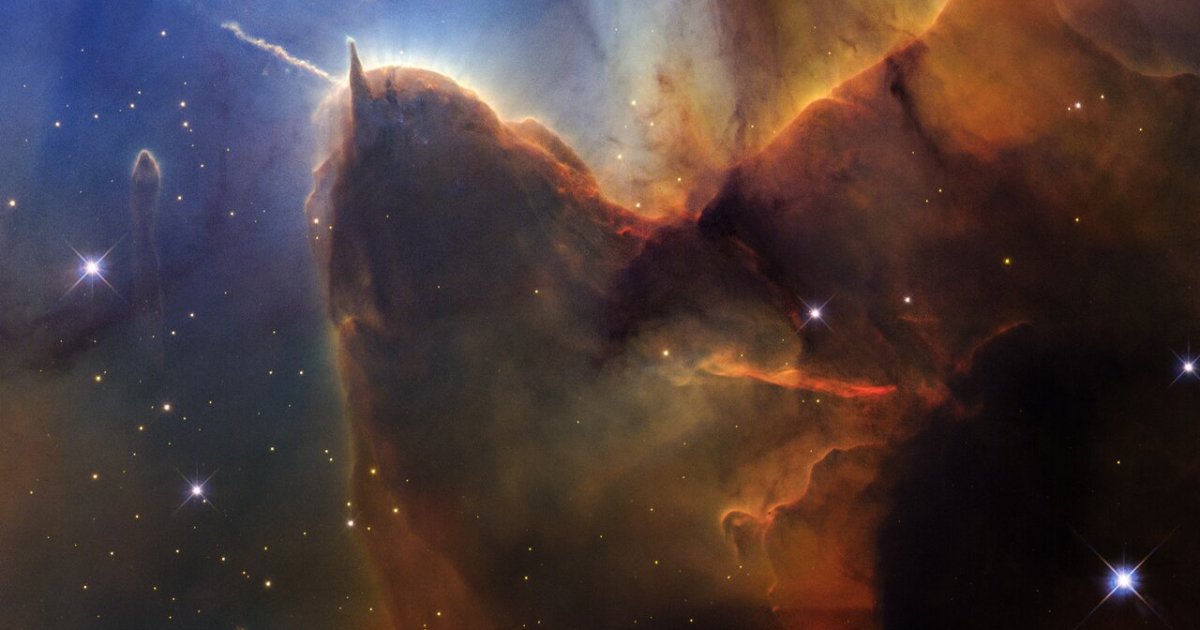 Hubble's 36th anniversary Wide Field Camera 3 image of the Trifid Nebula showing dust, gas, and the Herbig-Haro 399 protostar jet in a 5,000-light-year-distant star-forming region in Sagittarius.