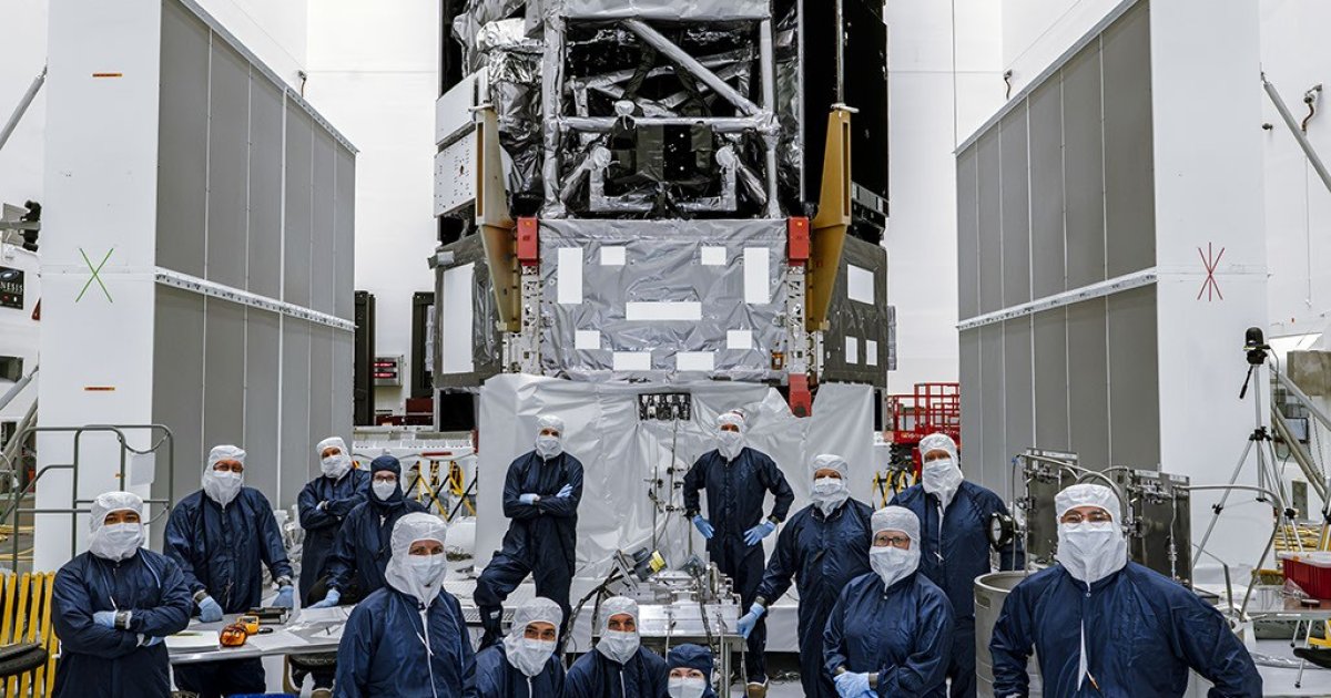 NASA's Nancy Grace Roman Space Telescope team poses with the observatory at Kennedy Space Center on July 20, 2026, prior to fueling operations. Credit: NASA/Sydney Rohde